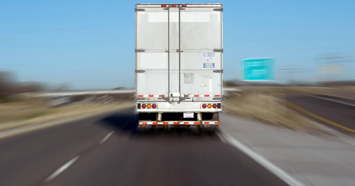 driving behind a semi truck on a highway