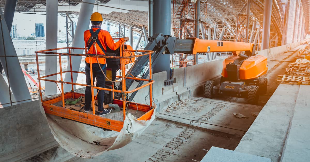 Construction worker on boom lift.