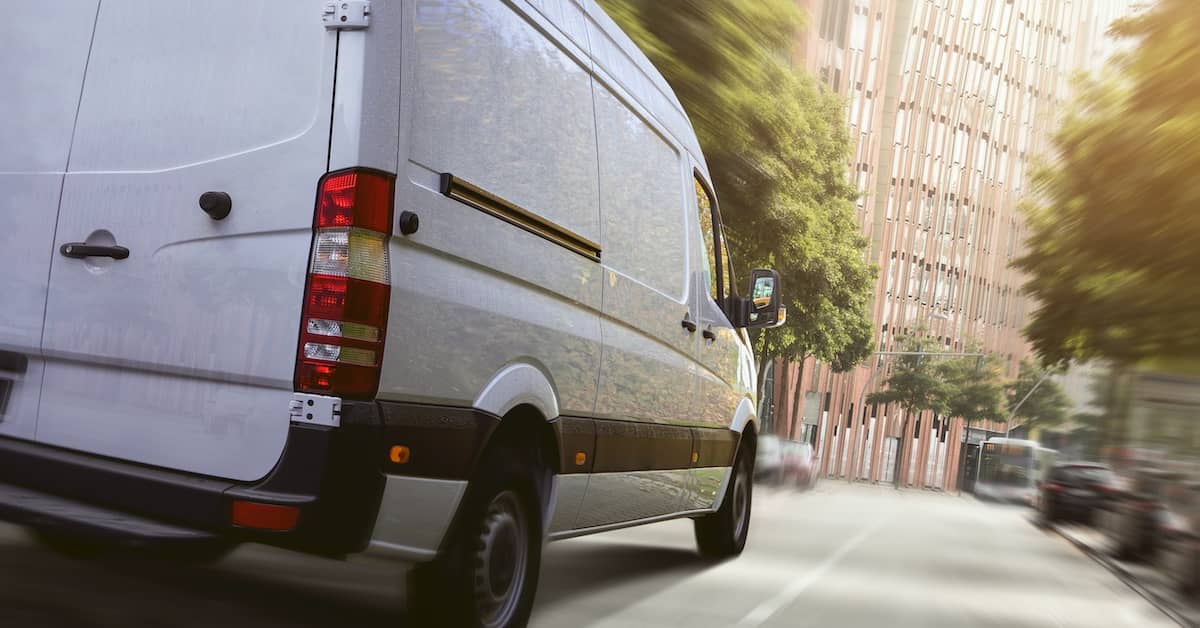 Commercial delivery van on street. | Patrick Daniel Law