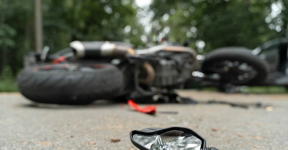 Motorcycle on side after accident. | Patrick Daniel Law